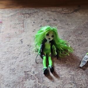 Green and Black Fashion Doll